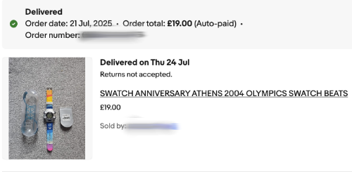 my second Swatch beat watch, a newer model with an Athens 2004 strap